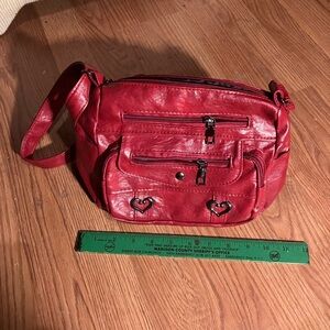 Small faux leather purse. Brand new and brand unknown.